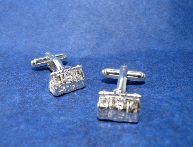 Dokterstas manchetknopen van zilver.